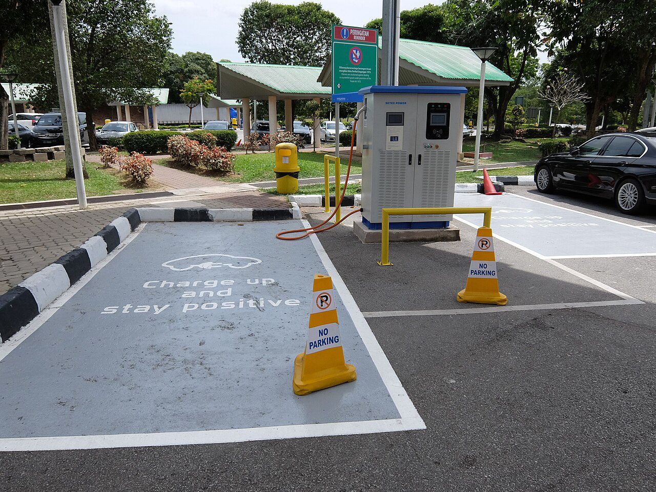 An EV charging station illustrating electric vehicles Malaysia for MM2H holders
