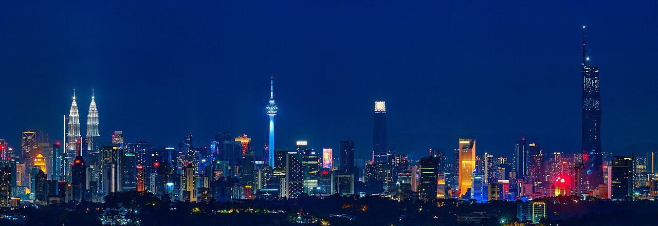 MM2H high net worth - Kuala Lumpur skyline at night with Merdeka 118, Malaysia