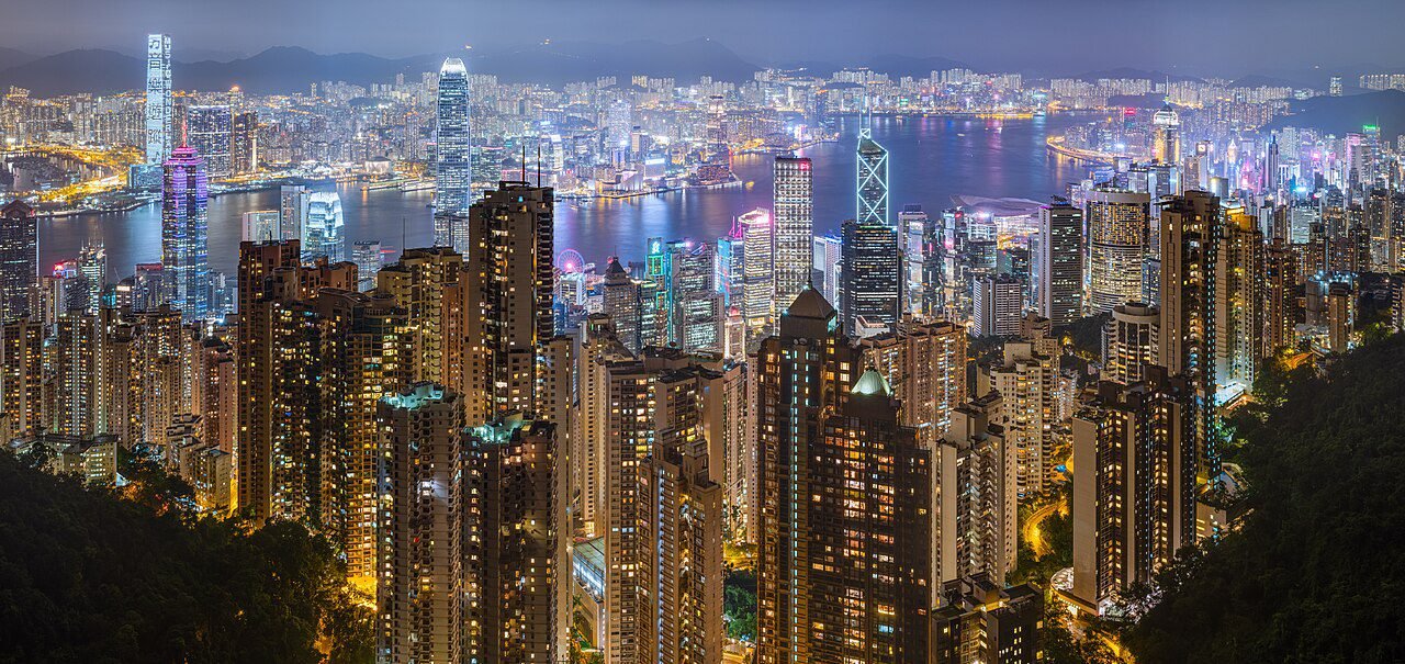 MM2H for Hong Kong and Singapore - Hong Kong Victoria Harbour skyline at night