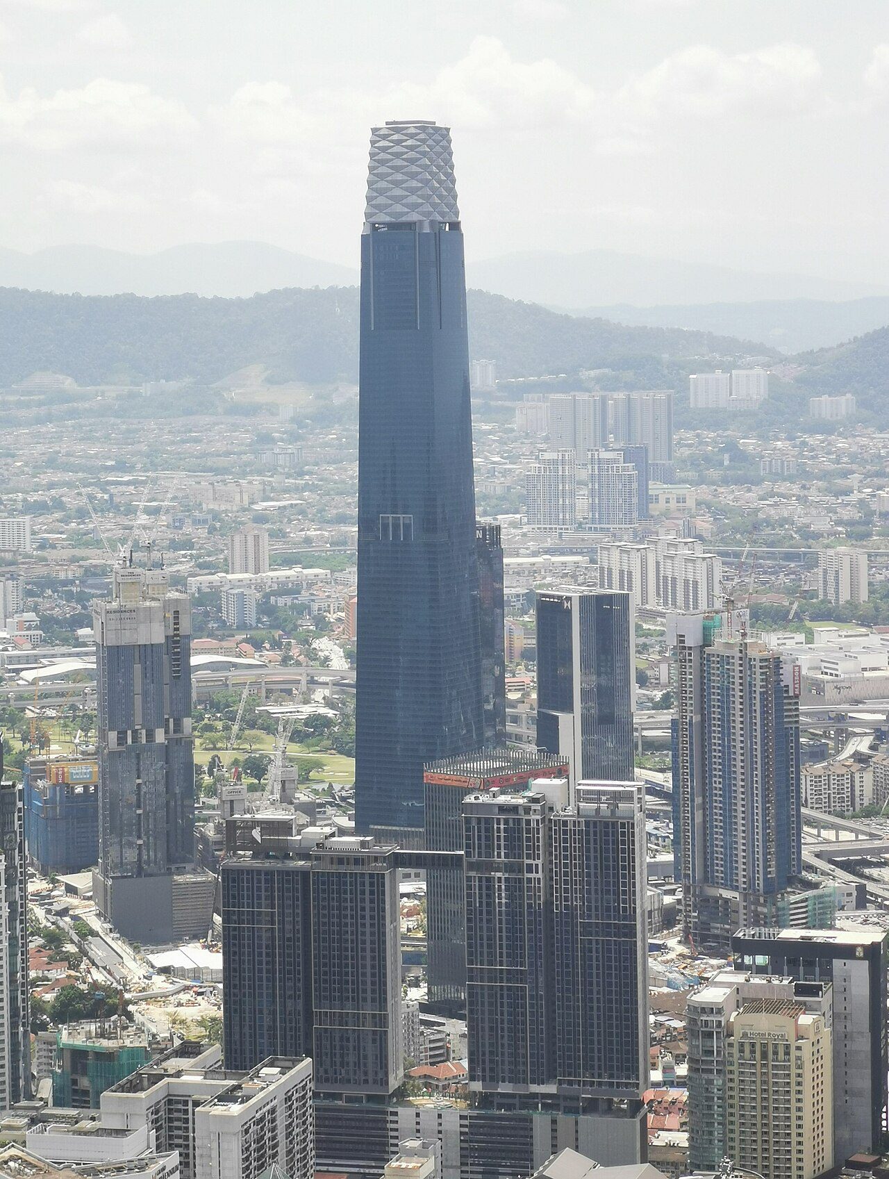 MM2H true cost - Tun Razak Exchange financial district skyline, Kuala Lumpur, Malaysia